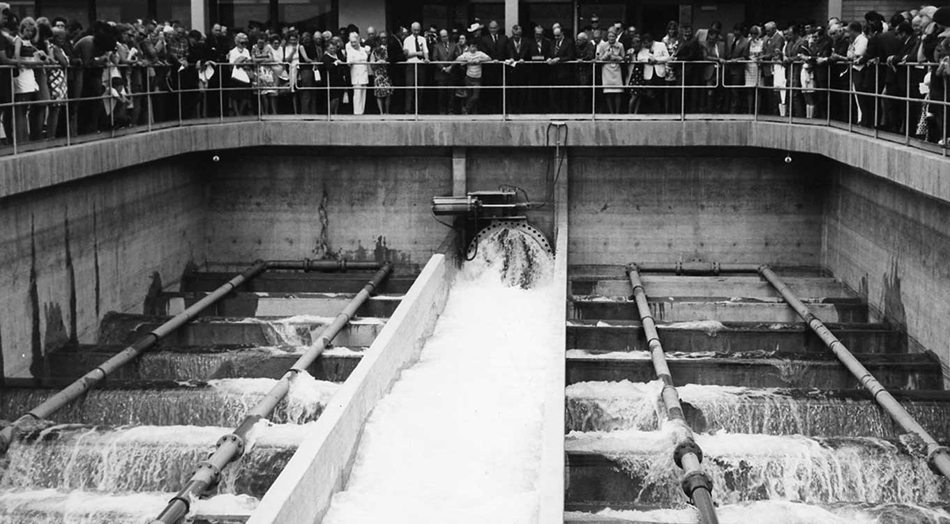 Grayscale photo of Southern Nevada Water Project water turn-on ceremony, at Alfred Merritt Smith Water Treatment Facility.