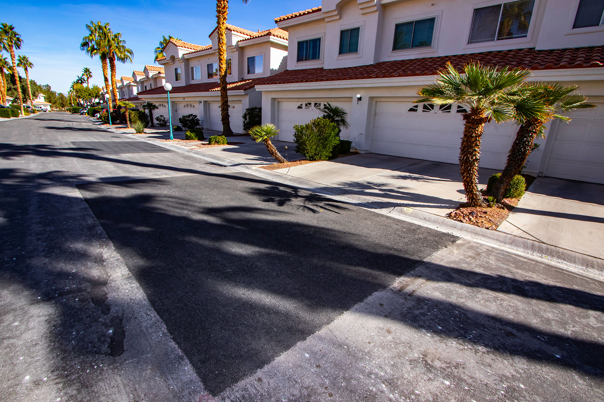 Final asphalt patch looks finished with clean lines