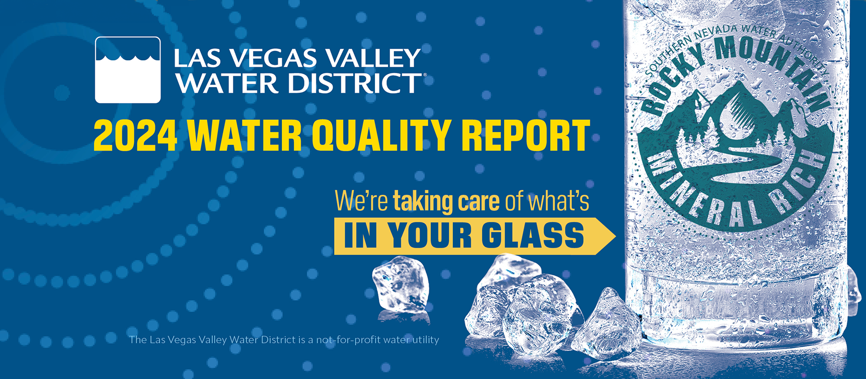 A glass of clear water with a logo that reads Rocky Mountain Mineral Rich. 
