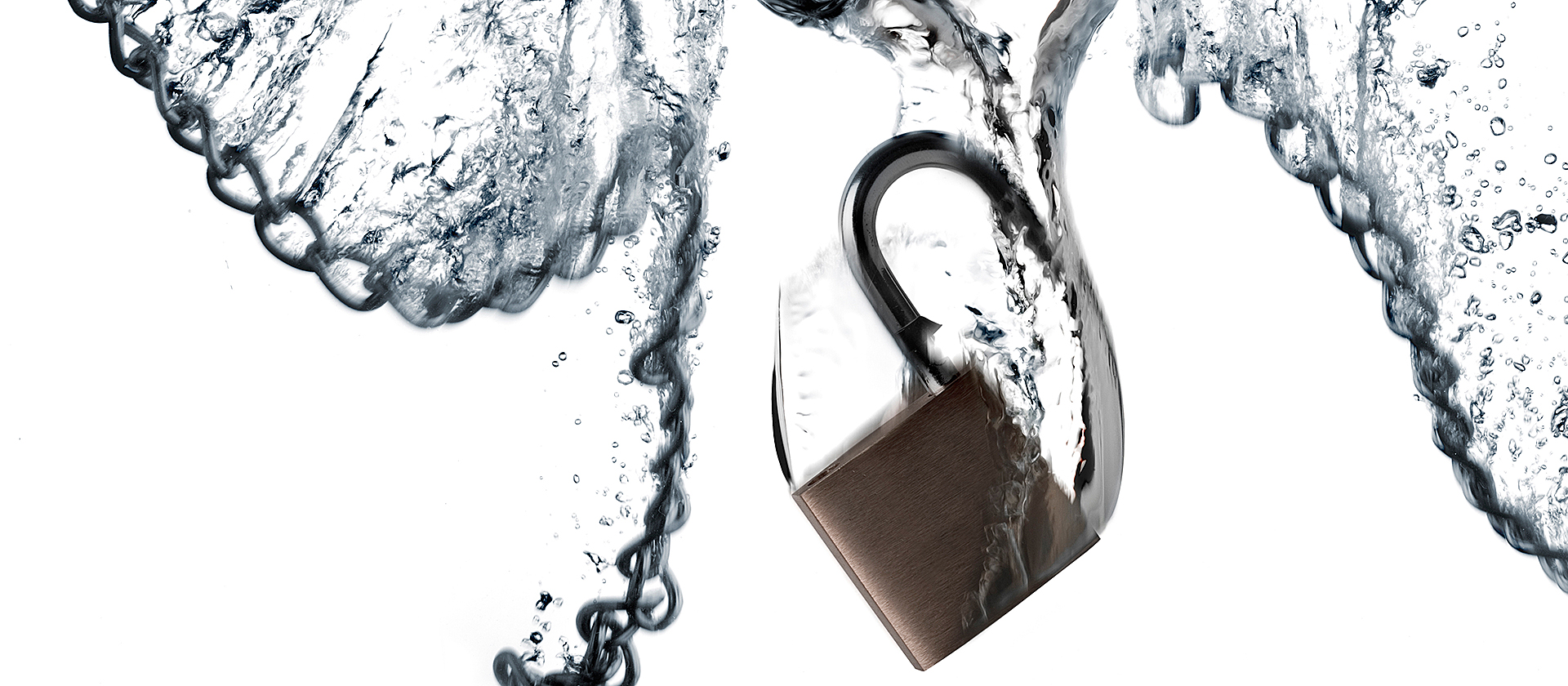 Chain and padlock submerged in water.